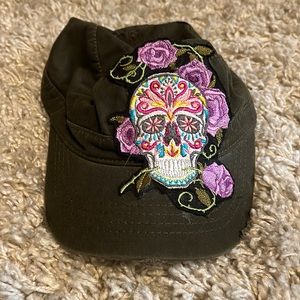 Army green paperboy hat with Dia De Los Muertos skull and flowers